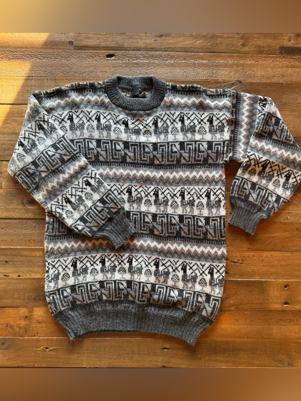 100% Alpaca Oversized Sweater in Soft Neutral Browns and Grays.